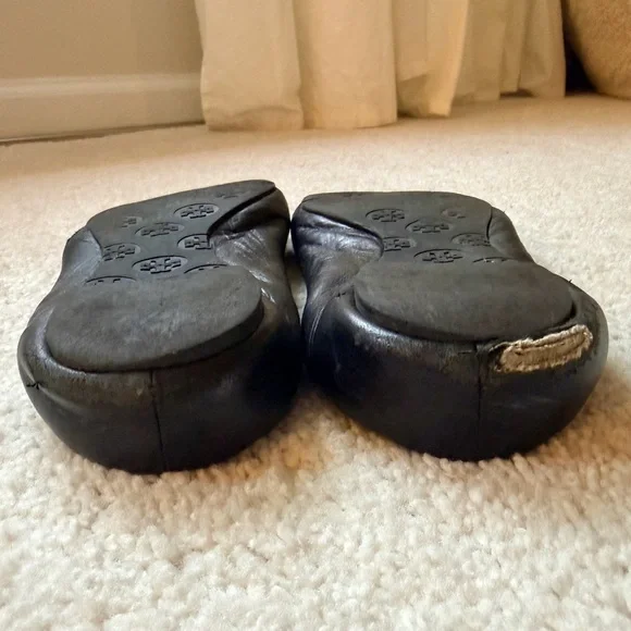 Tory Burch Black Flats with Gold Emblem - Picture 11 of 11